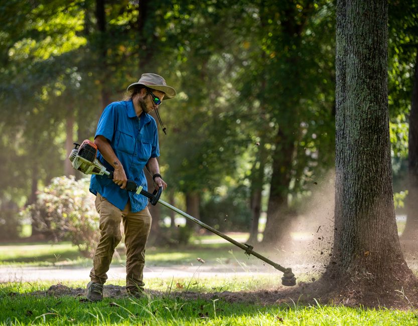 Professional landscaping team member at work